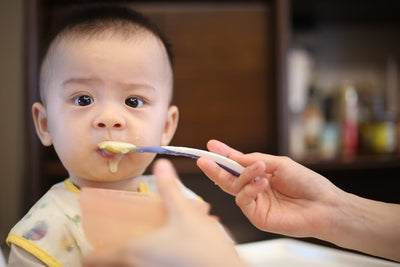 Will Starting Solid Foods Help My Baby Sleep Through the Night?